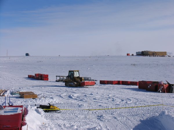 Fork moving cargo, and new South Pole in background.