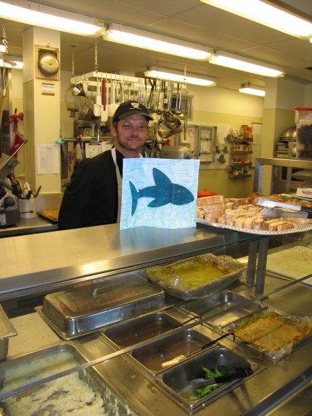 Flat Shark getting food at the South pole Galley