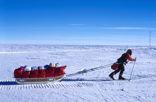 A lone skier heads from the South Pole towards the coast